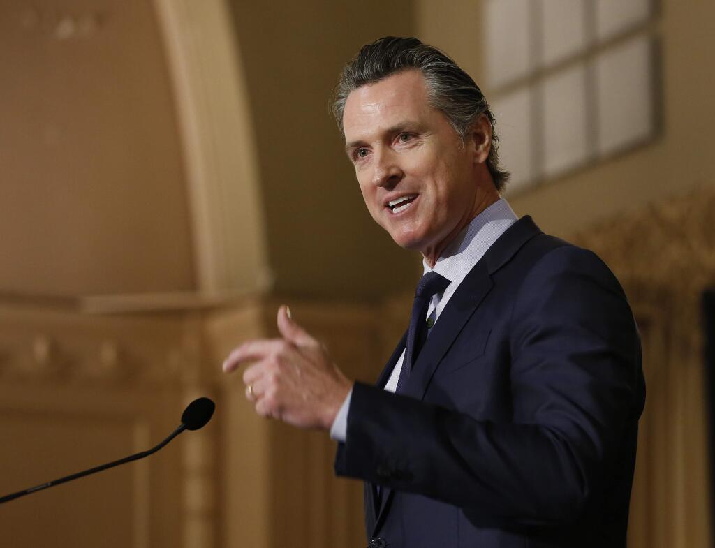 FOR PLANNING PURPOSE ONLY; EMBARGOED, NOT FOR PUBLICATION UNTIL 3:01 AM EST ON MONDAY, FEB. 11, 2019 - FILE - In this Jan. 17, 2019 file photo, Gov. Gavin Newsom speaks at the California Legislative Black Caucus Martin Luther King Jr., Breakfast, in Sacramento, Calif. Newsom is withdrawing several hundred National Guard troops from the nation's southern border and changing their mission. (AP Photo/Rich Pedroncelli, File)