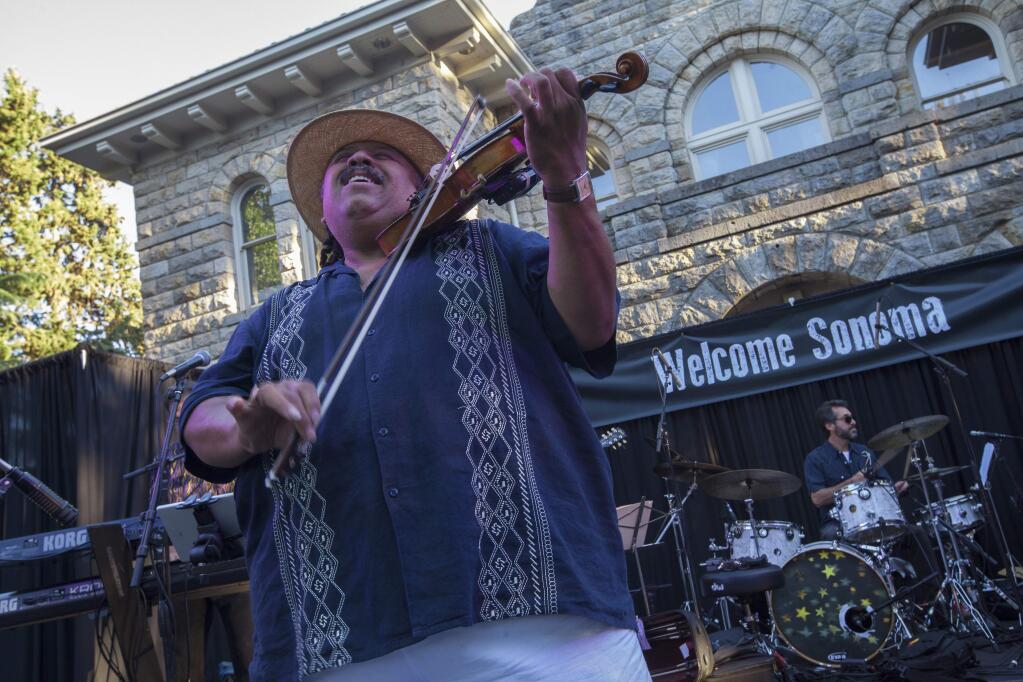 Carlos Reyes was one of the musicians who performed for the music-loving partygoers at Sonoma's annual City Party on Thursday, July 28, on the north side of City Hall on the Plaza.(Photos by Robbi Pengelly/Index-Tribune)