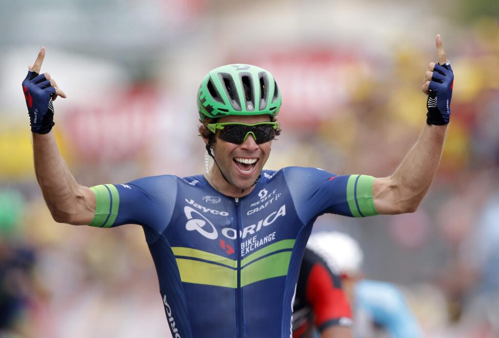 Australia's Michael Matthews celebrates as he crosses the finish line to win the tenth stage of the Tour de France cycling race over 197 kilometers (122.4 miles) with start in Escaldes-Engordany, Andorra, and finish in Revel, France, Tuesday, July 12, 2016. (AP Photo/Christophe Ena)