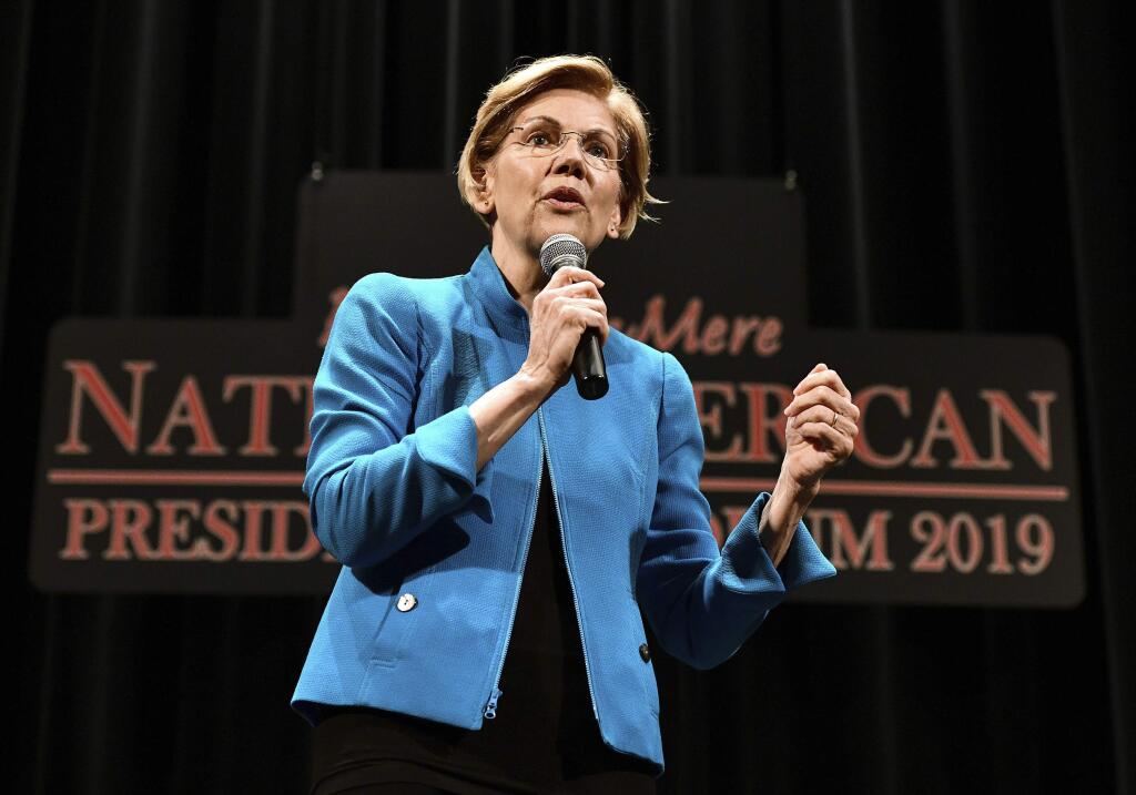 Elizabeth Warren, 2020 Democratic presidential hopeful, speaks during the first day of the Frank LaMere Native American Presidential Forum held Monday, Aug. 19, 2019 at the Orpheum Theatre in Sioux City, Iowa. (Tim Hynds/Sioux City Journal via AP)