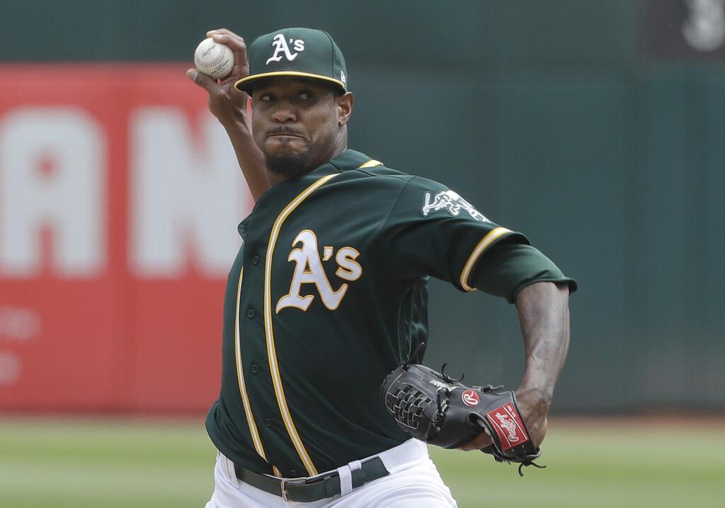 Oakland Athletics pitcher Edwin Jackson throws against the Texas Rangers during the first inning of a baseball game in Oakland, Calif., Wednesday, Aug. 22, 2018. (AP Photo/Jeff Chiu)