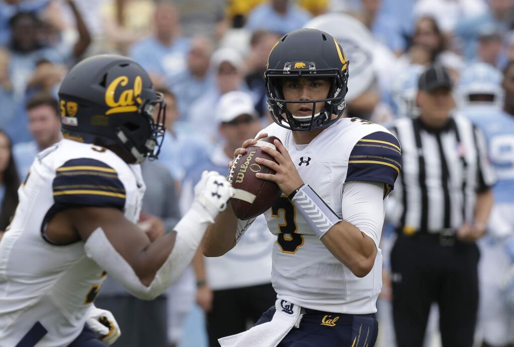 Cal quarterback Ross Bowers looks to pass during the first half against North Carolina in Chapel Hill, N.C., Saturday, Sept. 2, 2017. (AP Photo/Gerry Broome)