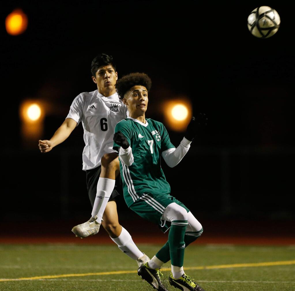 Healdsburg's Arturo Ortiz (6), left, and Sonoma Valley's Brian Rodriguez (7) jockey for position to receive a goal kick during the first half of a boys varsity soccer match between Sonoma Valley and Healdsburgs high schools in Windsor, California on Friday, January 5, 2018. (Alvin Jornada / The Press Democrat)