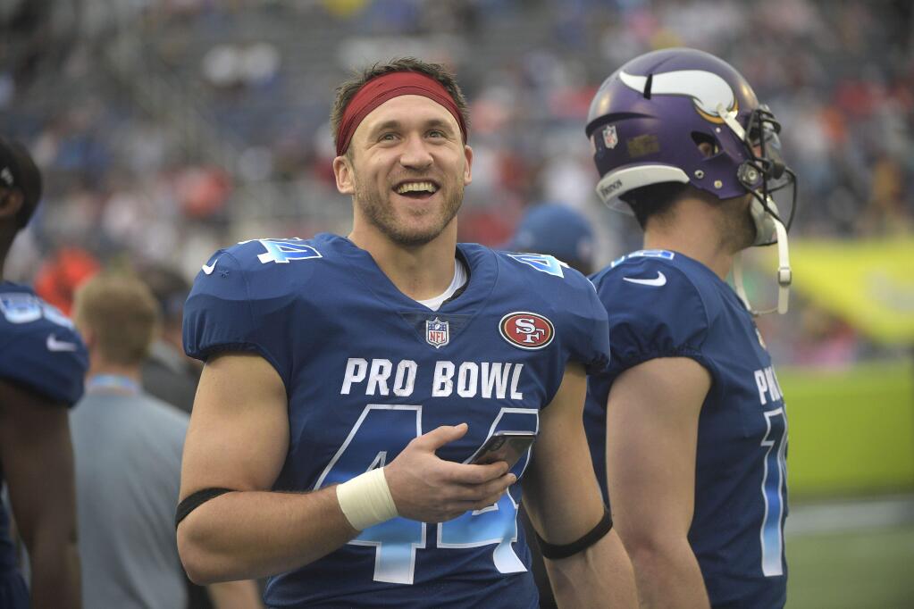 NFC fullback Kyle Juszczyk (44), of the San Francisco 49ers, looks up from the sidelines, during the second half of the NFL Pro Bowl football game against the AFC, Sunday, Jan. 28, 2018, in Orlando, Fla. (AP Photo/Phelan M Ebenhack)
