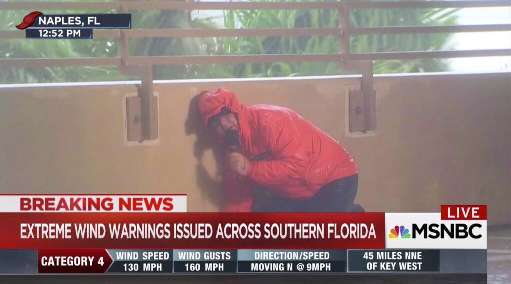 This image taken from video shows MSNBC's Kerry Sanders reporting on Hurricane Irma in Naples. Fla., on Sunday, Sept. 10, 2017. Journalists were the shock troops allowing the nation to experience the storm from the comfort of their living rooms. Networks all brought their top teams in on the weekend for special coverage, non-stop on the news channels. (MSNBC via AP)