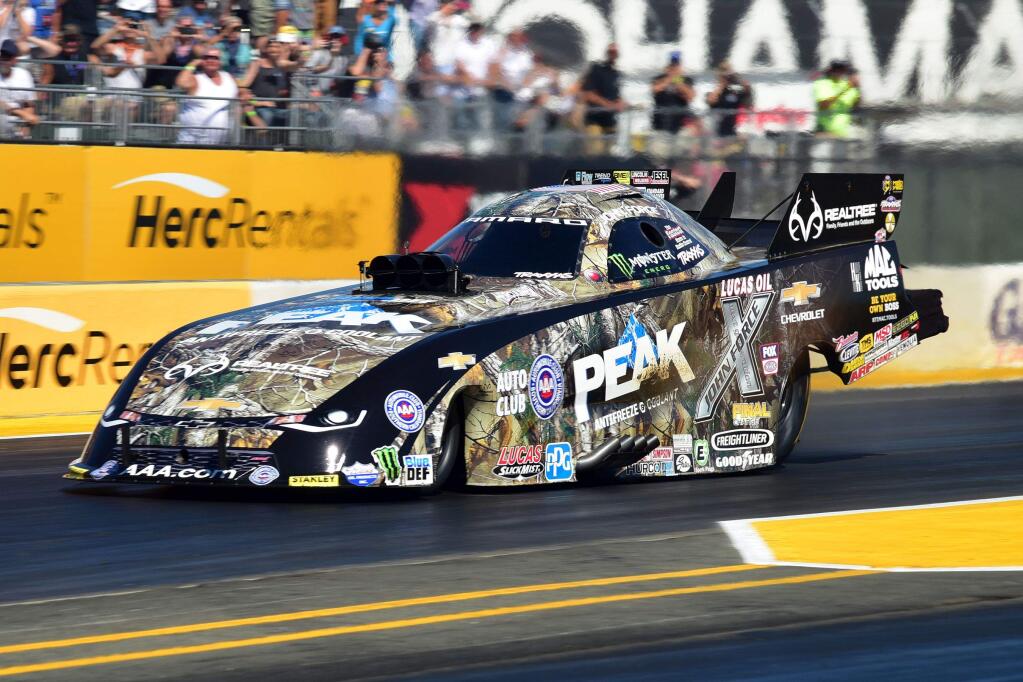 MIKE FINNEGAN PHOTOJohn Force raced to the Funny Car win in front of a sold-out crowd at the Toyota NHRA Sonoma Nationals at the Sonoma Raceway.