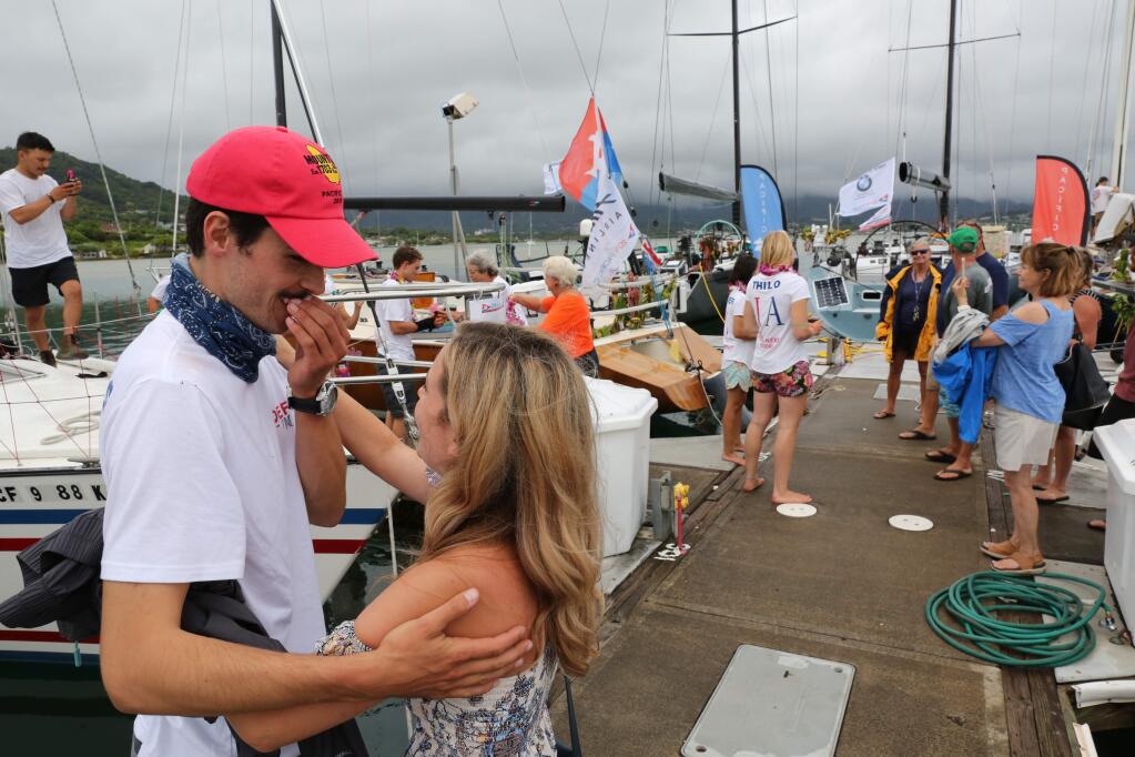 Santa Rosa City Councilman Jack Tibbetts hugs his fiancée, Ali Williams, after arriving in Oahu on Thursday, July 26, 2018. Tibbetts and his crew of six sailed from California to Hawaii in 14 days aboard their boat, the Defiance. (JACK TIBBETTS)