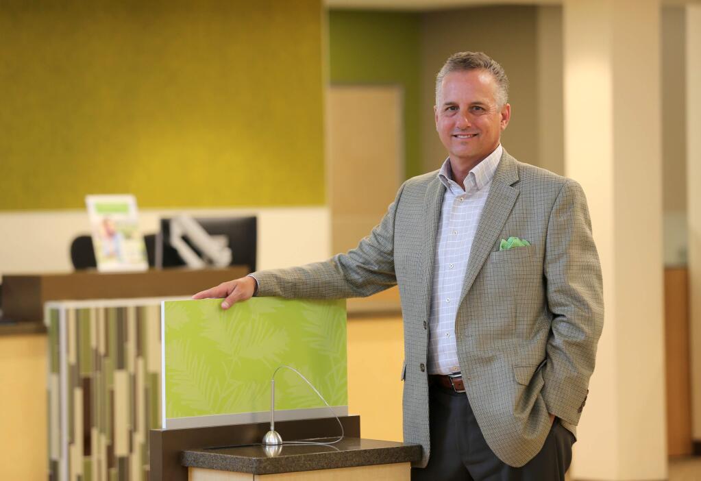 Redwood Credit Union President and CEO Brett Martinez at the newly refurbished N. Dutton Ave. location in Santa Rosa on Tuesday, August 20, 2019. (BETH SCHLANKER/ The Press Democrat)