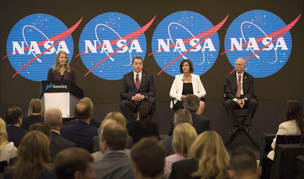 From right, Jeff Dewit, NASA's Chief Financial Officer; Robyn Gatens, NASA's Deputy Director of the International Space Station; Bill Gerstenmaier, NASA's associate administrator for the Human Exploration and Operations Mission, and Stephanie L. Schierholz Public Affairs Officer/Human Exploration and Operations, NASA, attend a news conference at Nasdaq in New York on Friday, June 7, 2019. NASA announced that the International Space Station will be open for private citizens, with the first visit expected to be as early 2020. (AP Photo/Marshall Ritzel)
