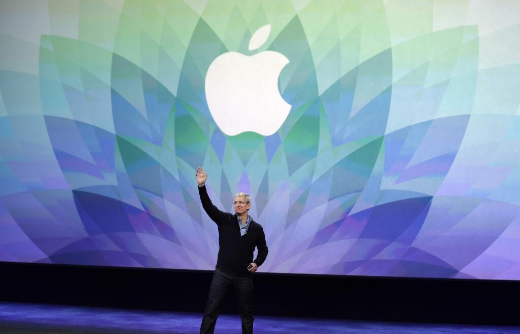 Apple CEO Tim Cook kicks off an Apple event on Monday, March 9, 2015, in San Francisco. (AP Photo/Eric Risberg)