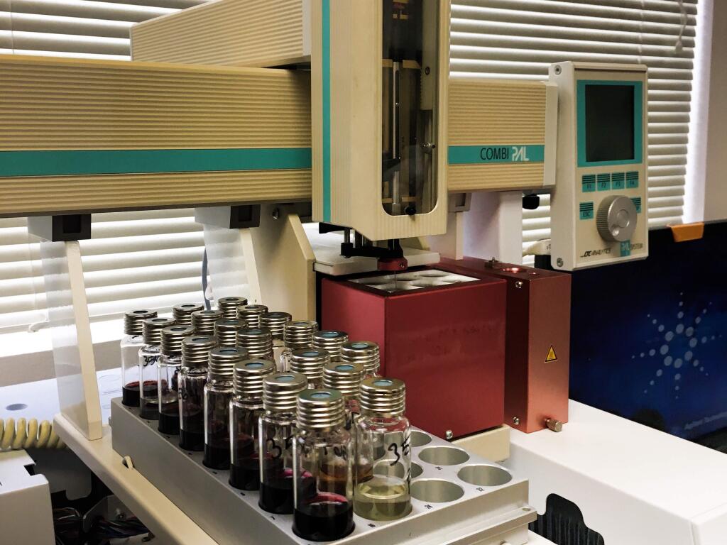 Wine samples are loaded into a gas chromography mass spectrometer analysis device at an Enartis/Vinquiry laboratory. (ENARTIS/VINQUIRY)