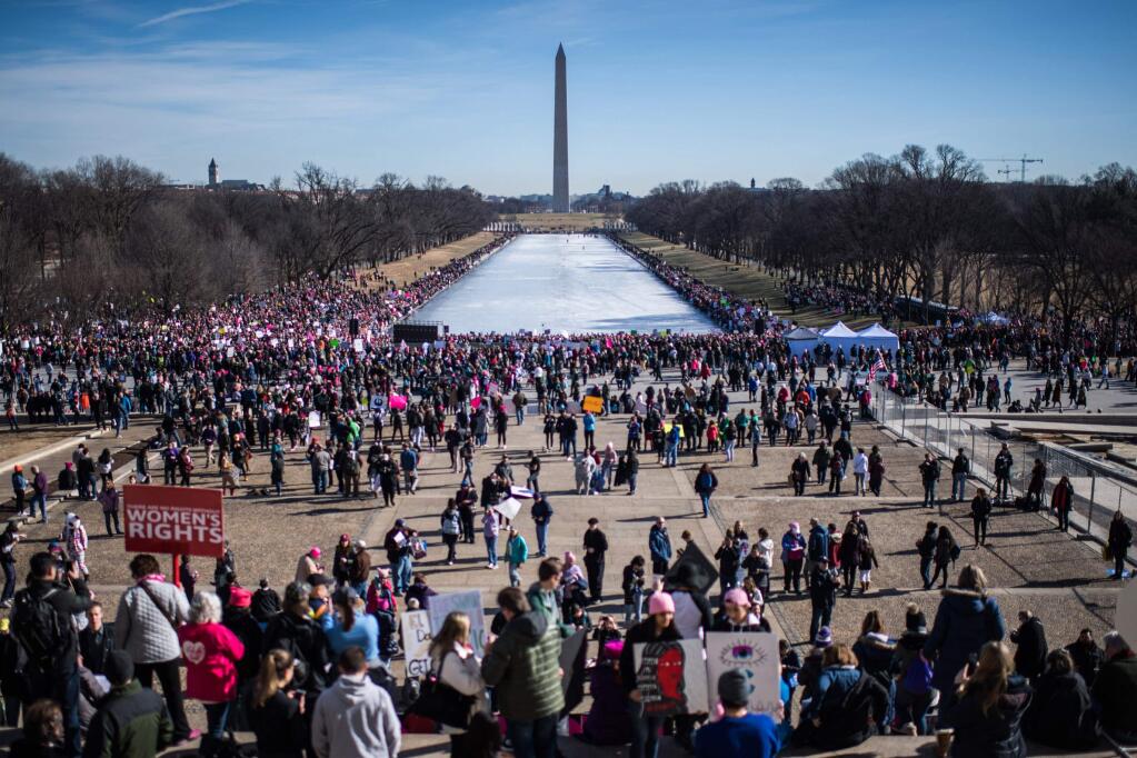 Demonstrators march in Washington for women's rights and against harassment in 2018. (SALWAN GEORGES / Washington Post)