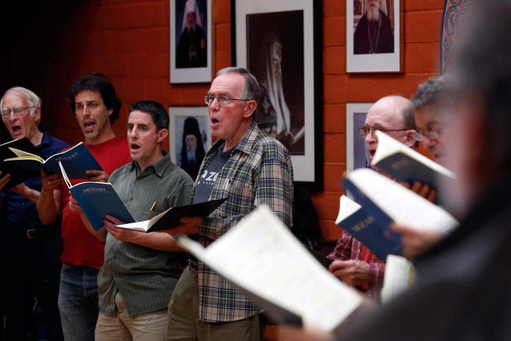 David Stohlmann, center, sings during Sonoma Bach Choir rehearsal of Mozart's 'Requiem' at Saints Peter and Paul Russian Orthodox Church in Santa Rosa on Wednesday, October 7, 2015. This year's Mozart's 'Requiem' concert will be held on Friday, April 19, at the Church of the Incarnation in Santa Rosa. (ALVIN JORNADA/ The Press Democrat)