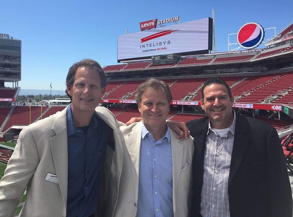 Petaluma-based Intelisys Communications co-founder Rick Sheldon, co-owner Dana Topping and co-founder Rick Dellar at Levi's Stadium in Santa Clara in August 2015. Sheldon and Dellar started the Petaluma company in 1994. Topping joined in 2006. (INTELISYS.COM)