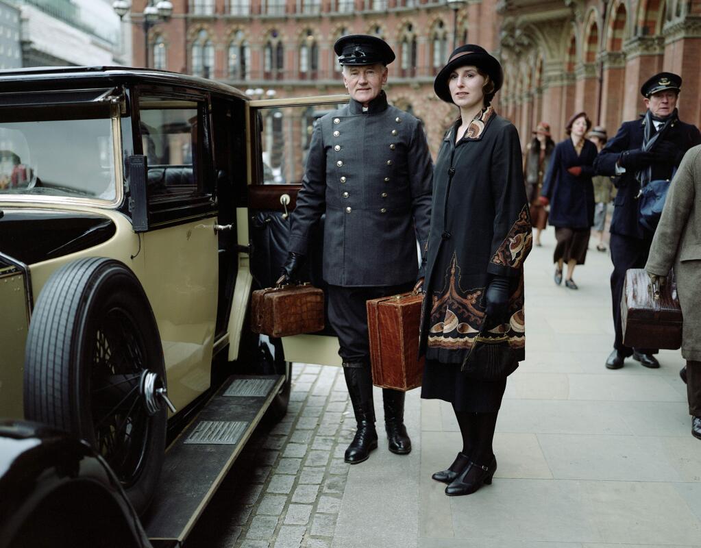 This photo released by PBS and Carnival Film and Television Limited shows Laura Carmichael as Lady Edith in a scene from season four of the Masterpiece TV series, 'Downton Abbey.' The show premieres Sunday, January 5, 2014 at 9 pm ET on PBS. 'Downton Abbey' will be back for its fifth season on Jan. 4, but the return date for another hit PBS series, 'Sherlock,' is up in the air, PBS chief executive Paula Kerger said Tuesday, July 22, 2014. (AP Photo/PBS/Masterpiece, Nick Briggs, file)