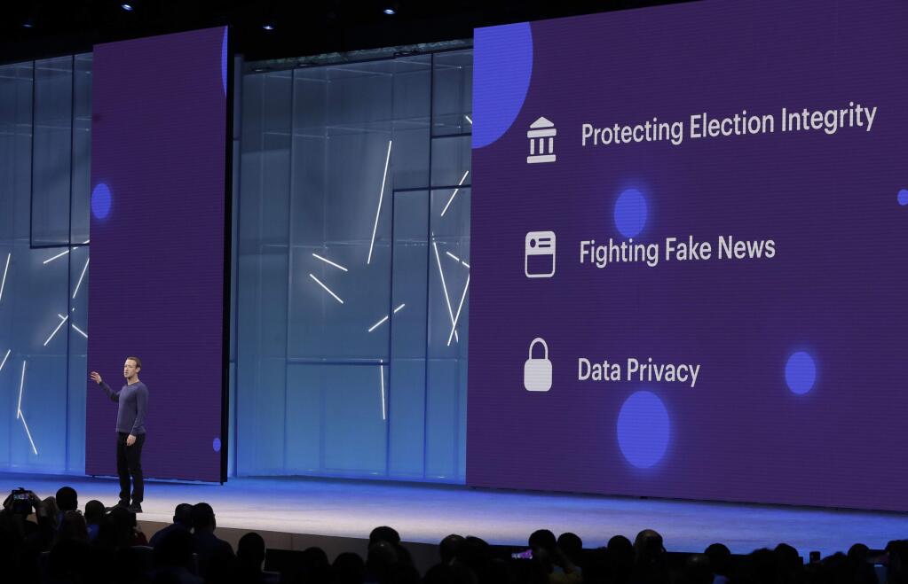 FILE- In this May 1, 2018, file photo Facebook CEO Mark Zuckerberg makes the keynote address at F8, Facebook's developer conference in San Jose, Calif. Facebook says it's expanding its fact-checking program to include photos and videos as it fights fake news and misinformation on its service. The move comes as bad actors seeking to sow political discord in the U.S. and elsewhere are embracing images and video to spread misinformation. (AP Photo/Marcio Jose Sanchez, File)