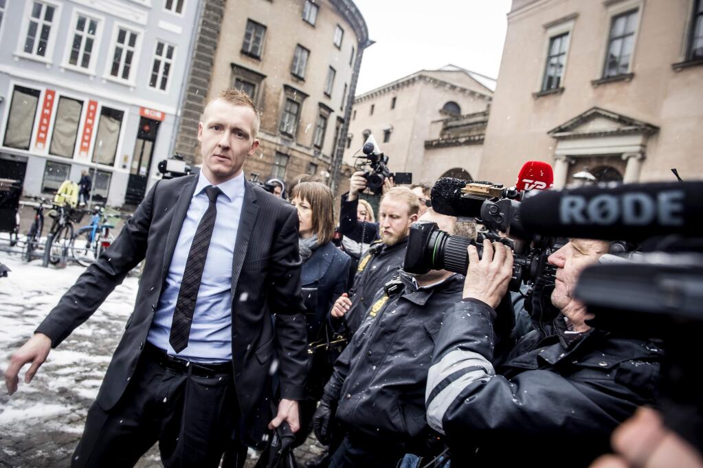 Prosecutor Jakob Buch-Jepsen arrives at the courthouse where the trial of Danish inventor Peter Madsen, charged with murdering and dismembering Swedish journalist Kim Wall aboard his homemade submarine begins, in Copenhagen, Thursday, March 8, 2018. (Mads Claus Rasmussen/Ritzau Scanpix via AP)