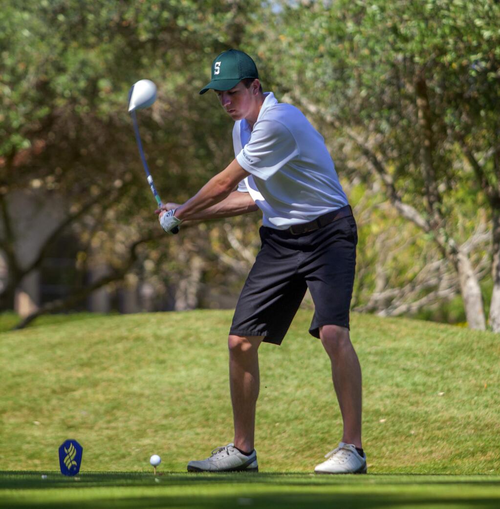 Robbi Pengelly/Index-TribuneSenior Cyle Caselli drives the ball off the first hole en route to his medalist performance leading the Dragons to their SCL dual-match finale victory over Petaluma last Thursday at the Sonoma Golf Club.