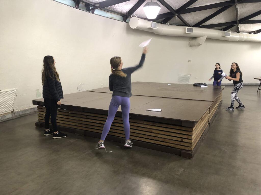 Students practice their paper airplane skills during the inaugural Wiseman-Cooke Day at the Petaluma Fairgrounds. (EMILY CHARRIER-ARGUS-COURIER)