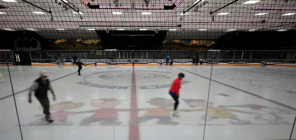 Ice skaters move about the rink during the public skate at the Redwood Empire Ice Arena in Santa Rosa on Tuesday, November 12, 2019. (Christopher Chung/ The Press Democrat)