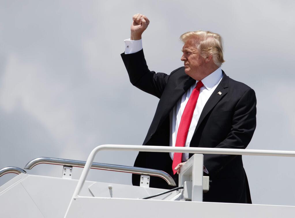 President Donald Trump boards Air Force One, Thursday, July 5, 2018, at Andrews Air Force Base, Md., en route to a rally in Great Falls, Mont. (AP Photo/Carolyn Kaster)
