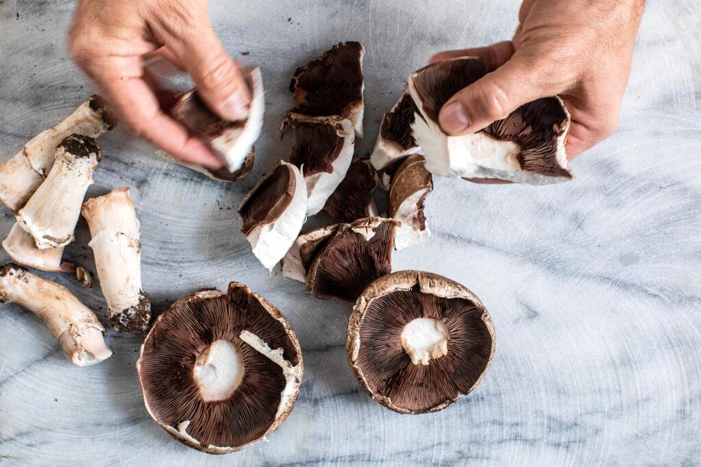 Portobello mushroom caps are marinated before being used in a Portobello & Caciocavallo Sandwich to pair with our wine of the week. (Andrew Scrivani/The New York Times)