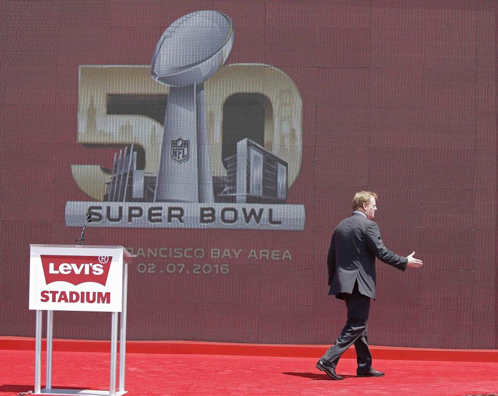 NFL Commissioner Roger Goodell walks off the stage after speaking on the opening day of Levi's Stadium Thursday, July 17, 2014, in Santa Clara, Calif. The $1.2 billion Levi's Stadium will host the Super Bowl in 2016. (AP Photo/Eric Risberg)