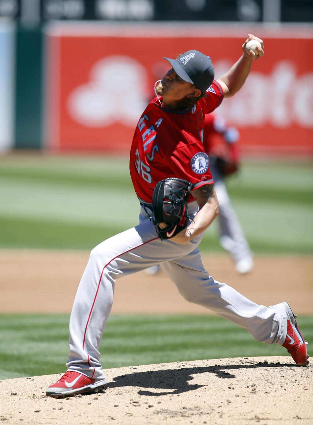 Los Angeles Angels starting pitcher Jered Weaver delivers against the Oakland Athletics during the first inning of a baseball game Sunday, June 19, 2016, in Oakland, Calif. (AP Photo/D. Ross Cameron)