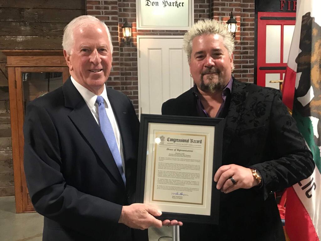 Congressman Mike Thompson, left, awards celebrity chef Guy Fieri with a '2019 Public Safety Hero of the Year' award. (Mike Thompson)