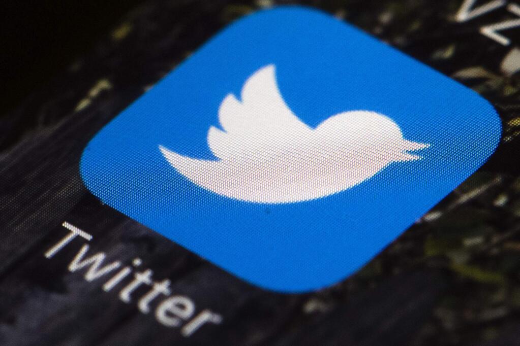FILE - This April 26, 2017, file photo shows the Twitter app icon on a mobile phone in Philadelphia. Twitter said Thursday, July 11, 2019, that it is investigating a problem with its service. Users across the U.S. and elsewhere are not able to access Twitter. (AP Photo/Matt Rourke, File)