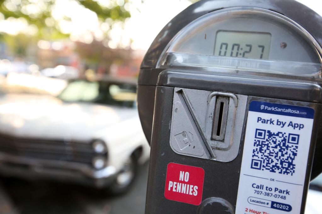Parking meters in downtown Santa Rosa along 4th street allow you to pay by phone by downloading an ap.
