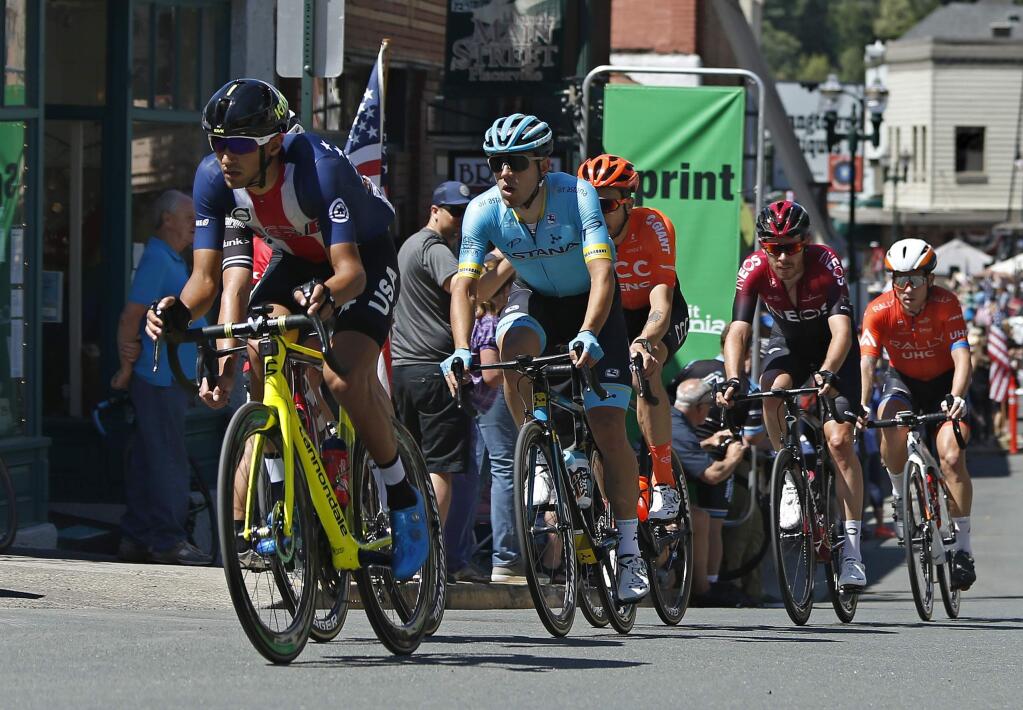 The leaders of the second stage of the Amgen Tour of California cycling race sprints along Main Street Monday, May 13, 2019, in Placerville. (AP Photo/Rich Pedroncelli)