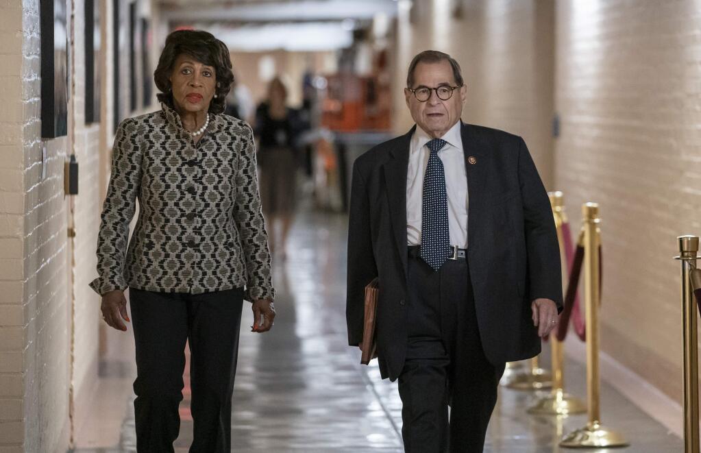 House Financial Services Committee Chairwoman Maxine Waters, D-Calif., left, and House Judiciary Committee Chairman Jerrold Nadler, D-N.Y., arrive for a gathering of the Democratic Caucus as Congress returns for the fall session, at the Capitol in Washington, Tuesday, Sept. 10, 2019. Nadler says his committee will move forward with impeachment hearings this fall, bolstered by lawmakers on the panel who roundly support moving forward. (AP Photo/J. Scott Applewhite)