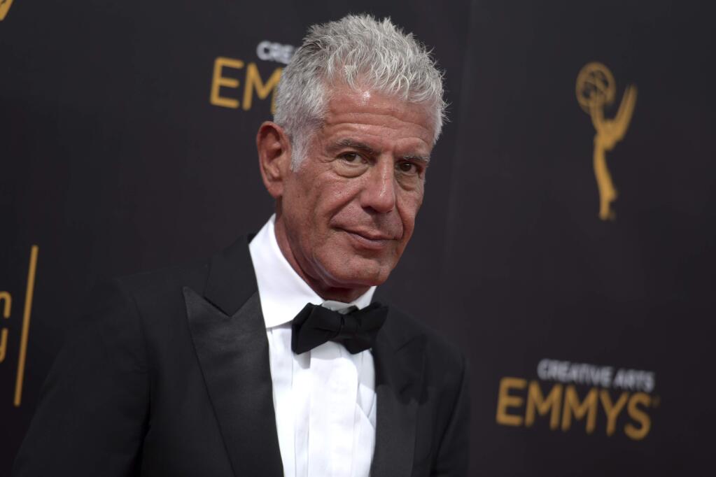 FILE - In this Sept. 11, 2016 file photo, Anthony Bourdain arrives at night two of the Creative Arts Emmy Awards at the Microsoft Theater in Los Angeles. Bourdain has been found dead in his hotel room in France, Friday, June 8, 2018, while working on his CNN series on culinary traditions around the world. (Photo by Richard Shotwell/Invision/AP, File)