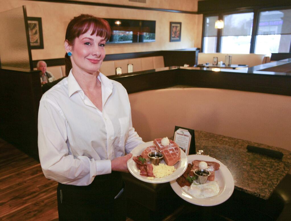 Service person of the week Rachel Anderson at work serving breakfast at Palms Grill in Petaluma on Tuesday February 17, 2014. (SCOTT MANCHESTER/ARGUS-COURIER STAFF)