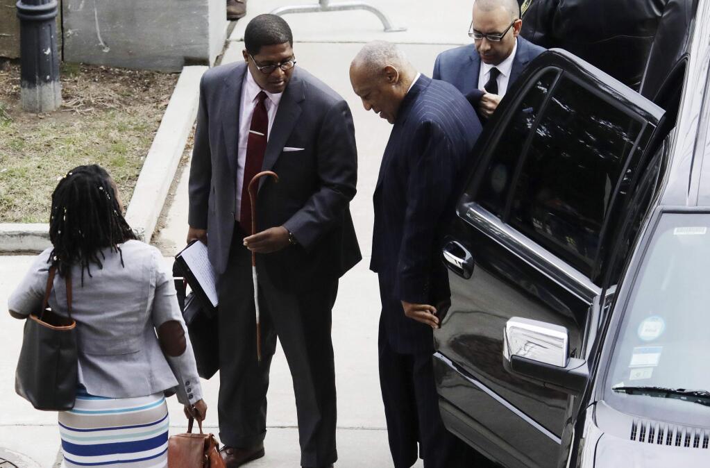 Actor and comedian Bill Cosby climbs out of his vehicle as he arrives during the retrial of his sexual assault case at the Montgomery County Courthouse in Norristown, Pa., on Wednesday, April 11, 2018. (Dominick Reuter/Pool Photo via AP)