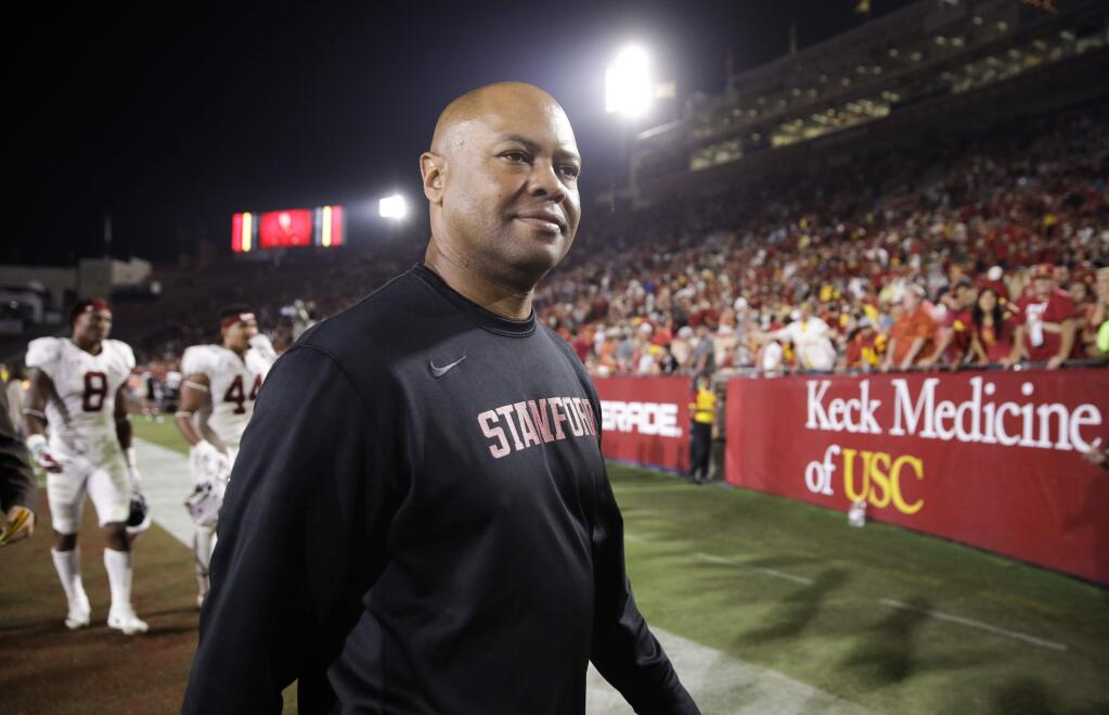 Stanford head coach David Shaw leaves the field after an NCAA college football game with Southern California, Saturday, Sept. 9, 2017, in Los Angeles. USC won 42-24. (AP Photo/Jae C. Hong)