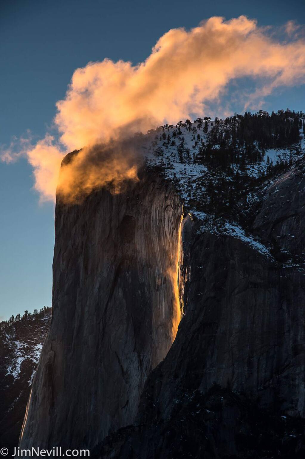 An amazing fire-toned cloud sits over El Capitan in Yosemite on the evening of February 18, when the light of the setting sun hit Horsetail Fall at just the right angle, creating a firefall that glowed orange and red.