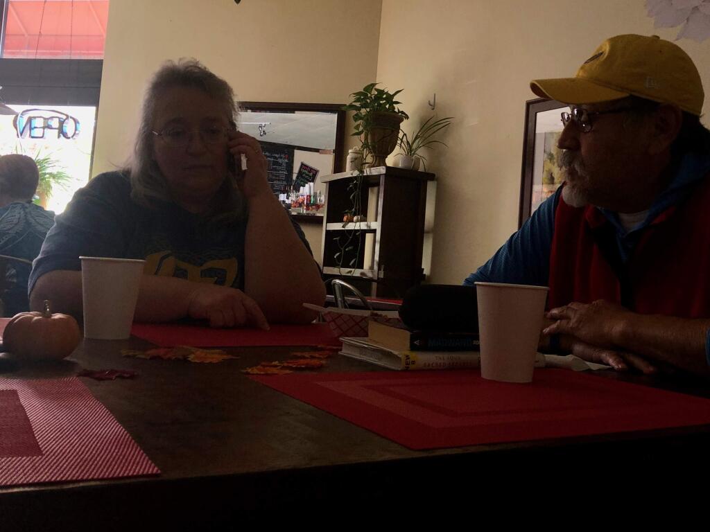 Leyla and Richard Carreon of Oakmont lost power and went to Colleen's Coffee Shop in Santa Rosa for a cup of coffee and a meal on Wednesday, Nov. 20, 2019. (YOUSEF BAIG/ PD)