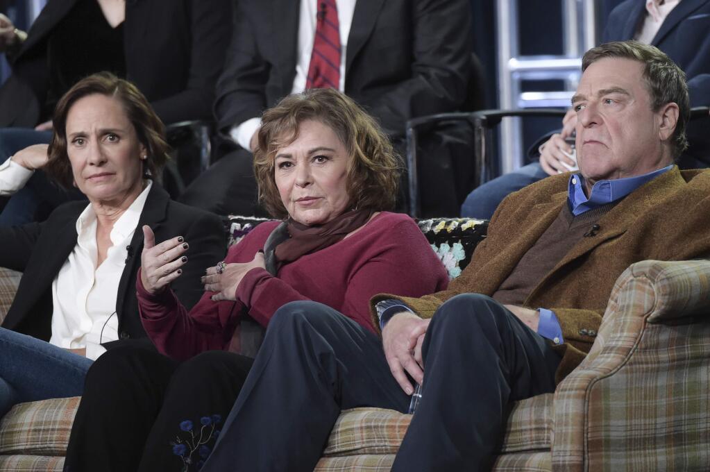 FILE - In this Jan. 8, 2018 file photo, Laurie Metcalf, from left, Roseanne Barr and John Goodman participate in the 'Roseanne' panel during the Disney/ABC Television Critics Association Winter Press Tour in Pasadena, Calif. (Photo by Richard Shotwell/Invision/AP, File)