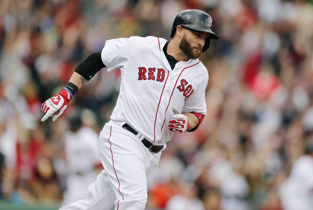 The Athletics acquired Jon Lester and Jonny Gomes (pictured) from the Red Sox for slugging outfielder Yoenis Cespedes before Thursday's, July 31, 2014, trade deadline. (AP Photo/Michael Dwyer)