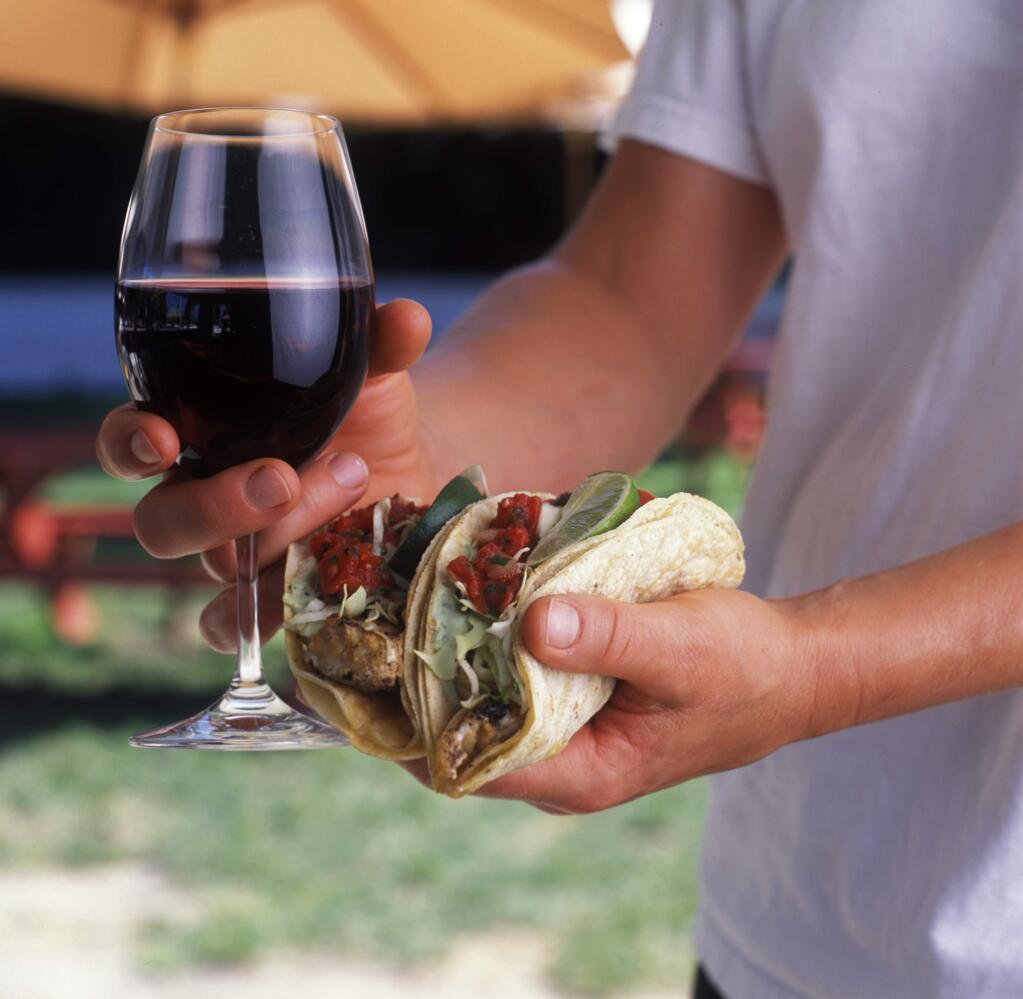 Fat and tannin are made for each other, so an astringent cabernet sauvignon works extremely well with fish tacos topped with juicy Mexican slaw. (Press Democrat archive)