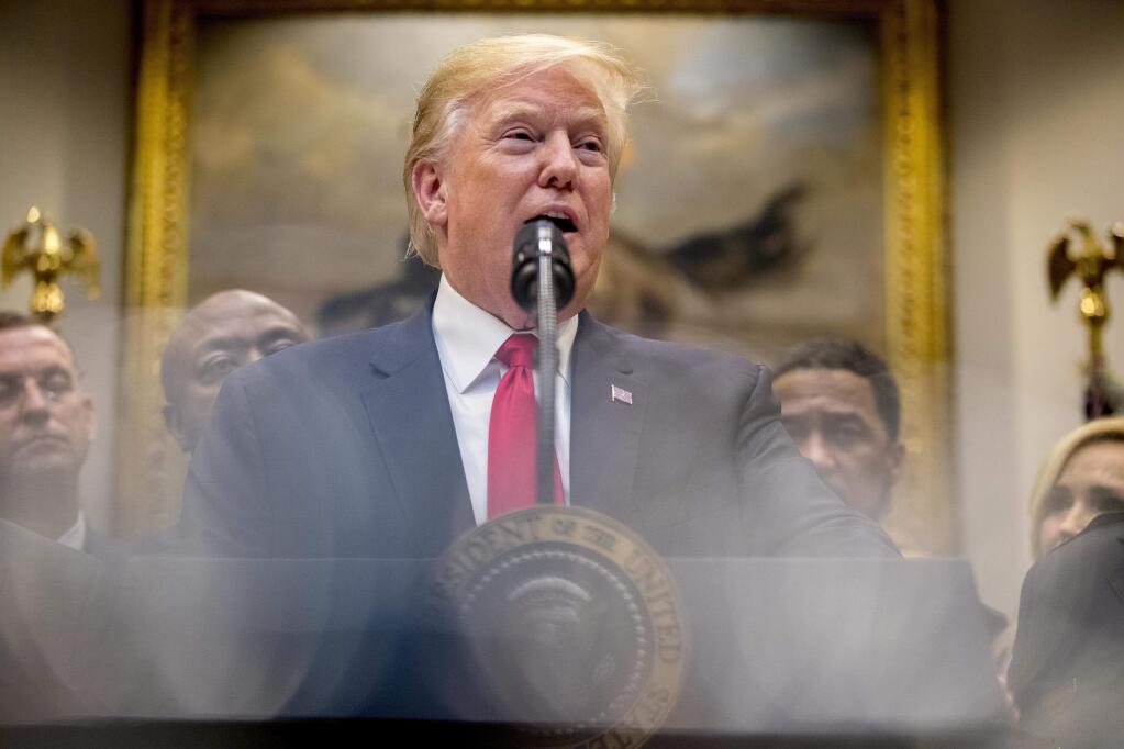 President Donald Trump speaks in the Roosevelt Room of the White House in Washington, Wednesday, Nov. 14, 2018, to announce his support for the first major rewrite of the nation's criminal justice sentencing laws in a generation. (AP Photo/Andrew Harnik)