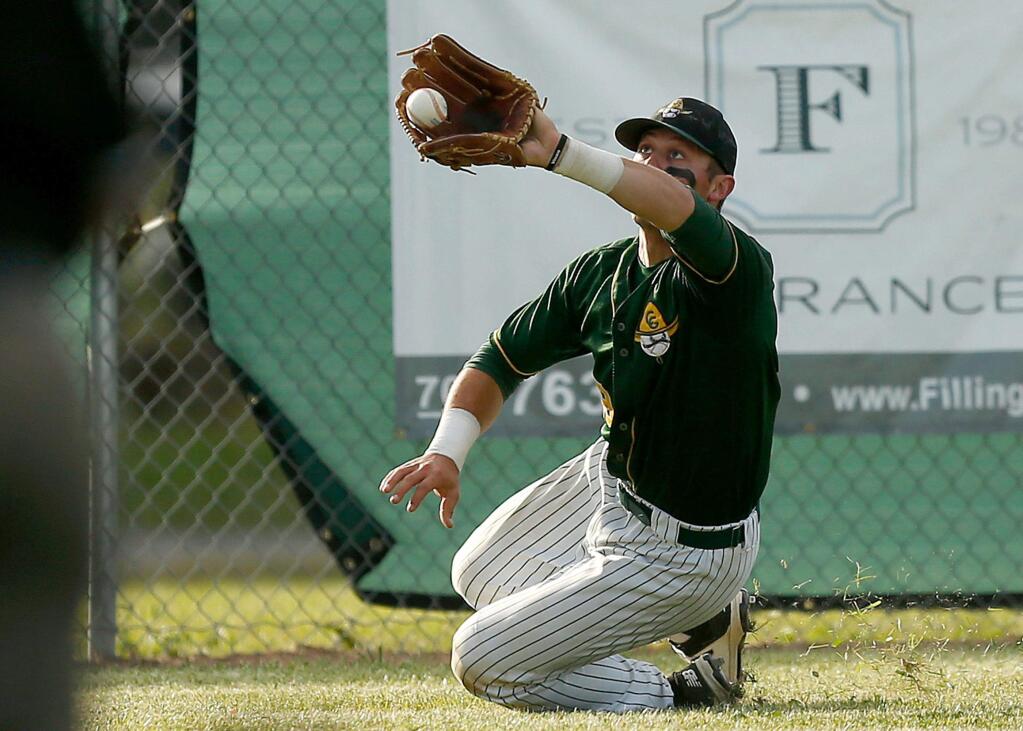 Casa Grande's left fielder Spencer Torkelson dives to make a catch in the top of the fourth inning of the NCS Division II semifinal baseball game between Ukiah and Casa Grande high schools in Petaluma, California, on Wednesday, May 31, 2017. (Alvin Jornada / The Press Democrat)