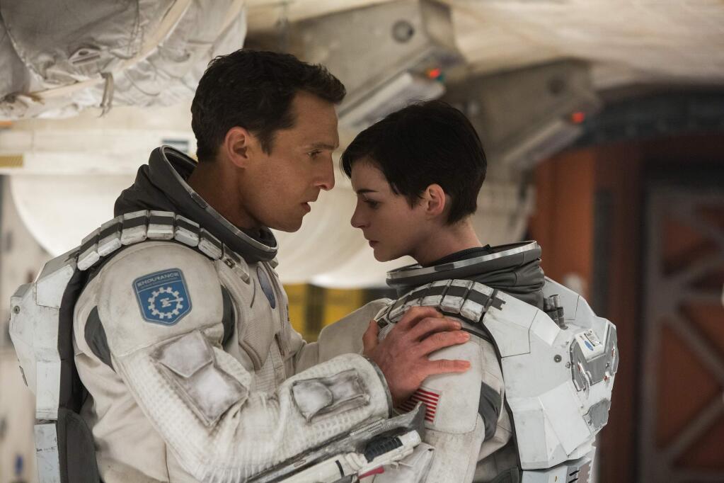 This photo released by Paramount Pictures shows, Matthew McConaughey, left, and Anne Hathaway, in a scene from the film, ''Interstellar,' from Paramount Pictures and Warner Brothers Pictures, in association with Legendary Pictures. (AP Photo/Paramount Pictures, Melinda Sue Gordon)