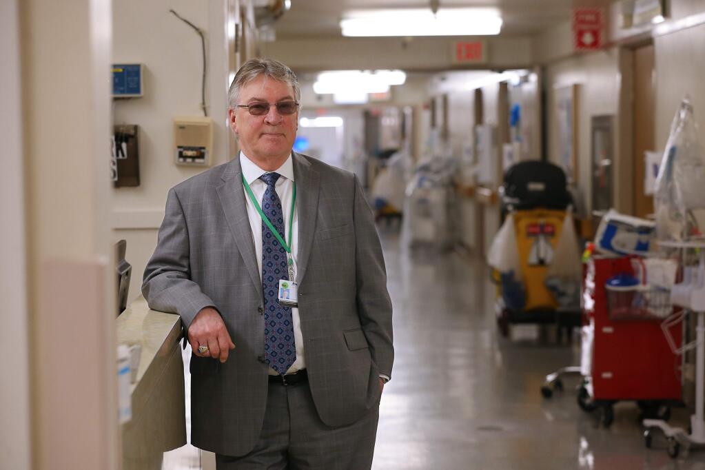 Healdsburg District Hospital CEO Joe Harrington in the old section of the hospital that needs to be retrofitted to meet seiemic safety requirements, in Healdsburg on Thursday, April 18, 2019. (Christopher Chung/ The Press Democrat)