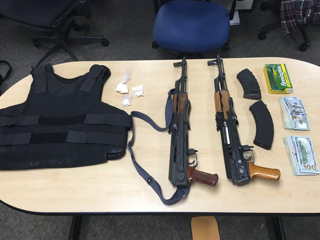 Four men were arrested after police discovered assault rifles, cocaine and cash at a Santa Rosa home on Wednesday, March 22, 2017. (COURTESY OF SANTA ROSA POLICE DEPARTMENT)