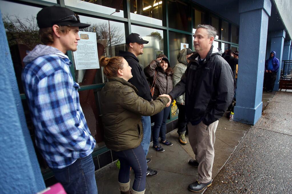 Vinnie Cilurzo, greets the beer fans waiting in line for his Pliny the Younger release in 2014. (Christopher Chung/ The Press Democrat)
