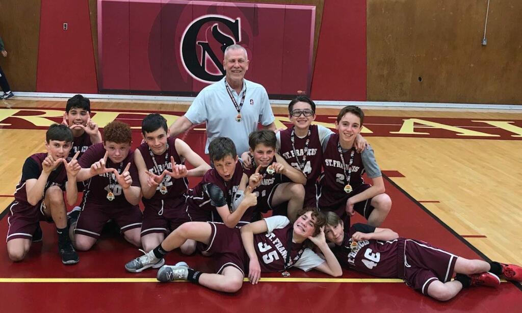 St. Francis Solano's 7th grade boys CYO team went undefeated in the 2019-2020 season, going 10-0. Coach is Nickolai Mathison. From left: Henry Foster, Salvadore Diaz (in back) Jakob Hilton, Will Murphy, Cieven Canning, Nick Cope, Jaden Dudy (lying), Giovanni Stewart (goggles), Koen Flocco, Jack Stambaugh and coach Nickolai Mathison, center.