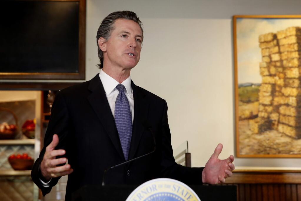 Gov. Gavin Newsom announces new criteria related to coronavirus hospitalizations and testing that could allow counties to open faster than the state, during a news conference at Mustards Grill in Napa, Calif., Monday May 18, 2020. (AP Photo/Rich Pedroncelli, Pool)